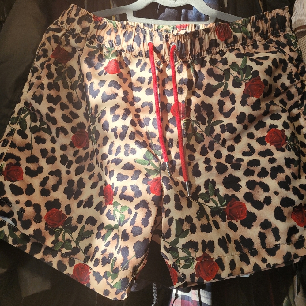 Forever 21 New men swim trunks with net. Leopard with roses size large.
